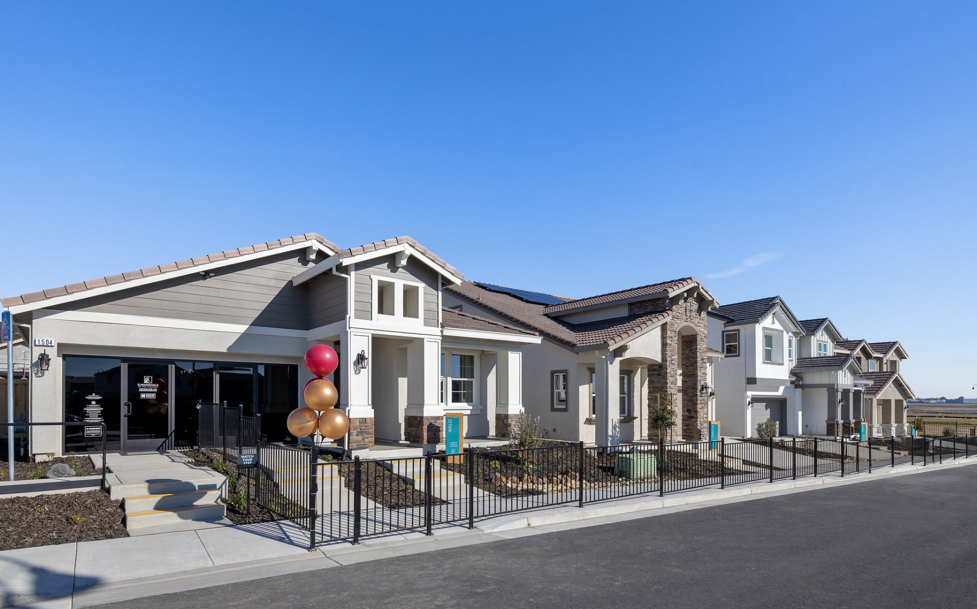 External elevations of Spanish style 2-story homes for grand opening of Summerwalk community in Fairfield, CA.