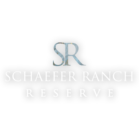 Schaefer Ranch Reserve logo featuring an SR monogram in a watercolor blue finish
