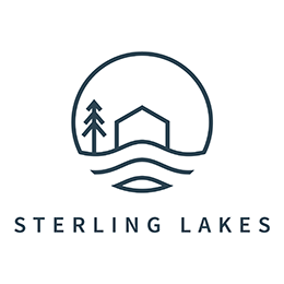 Sterling Lakes logo featuring a home, pine tree, and water icon inside a circle